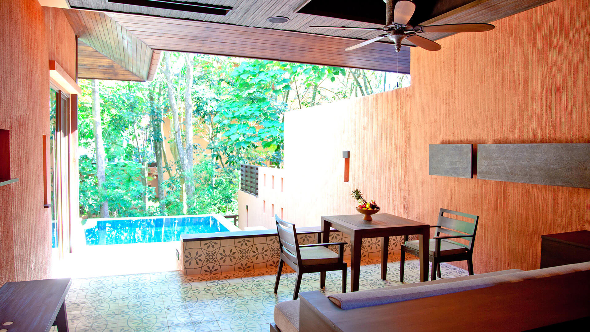family suite hotel pool villas in phuket 1 bedroom living area garden view